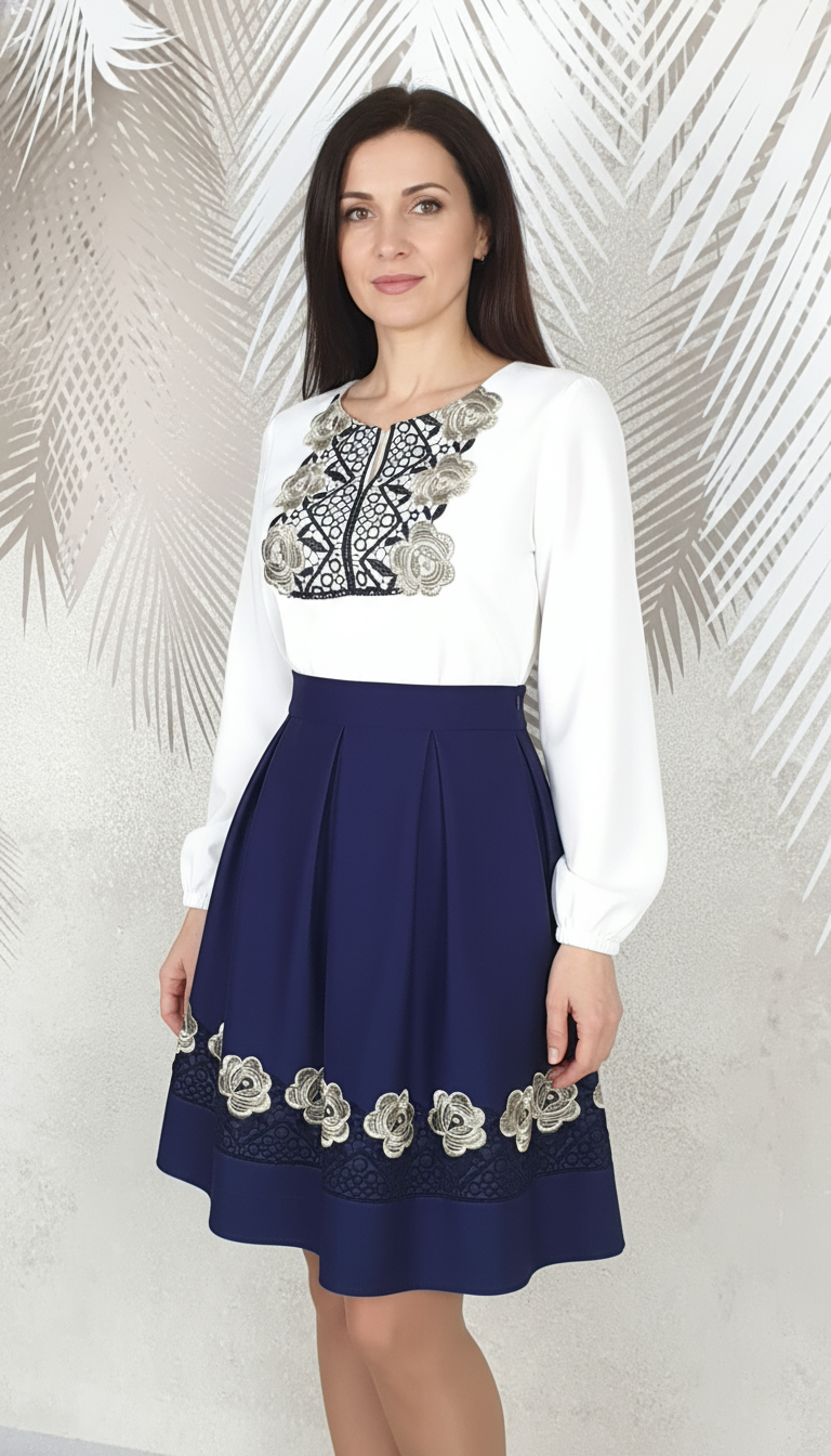 Compleu bluza alba stilizata si fusta bleumarin in pliuri cu broderie Melania